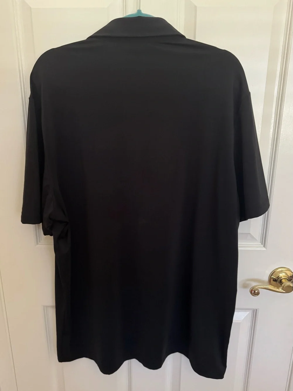 Adidas men's polo size XL.  Black.  Excellent condition.